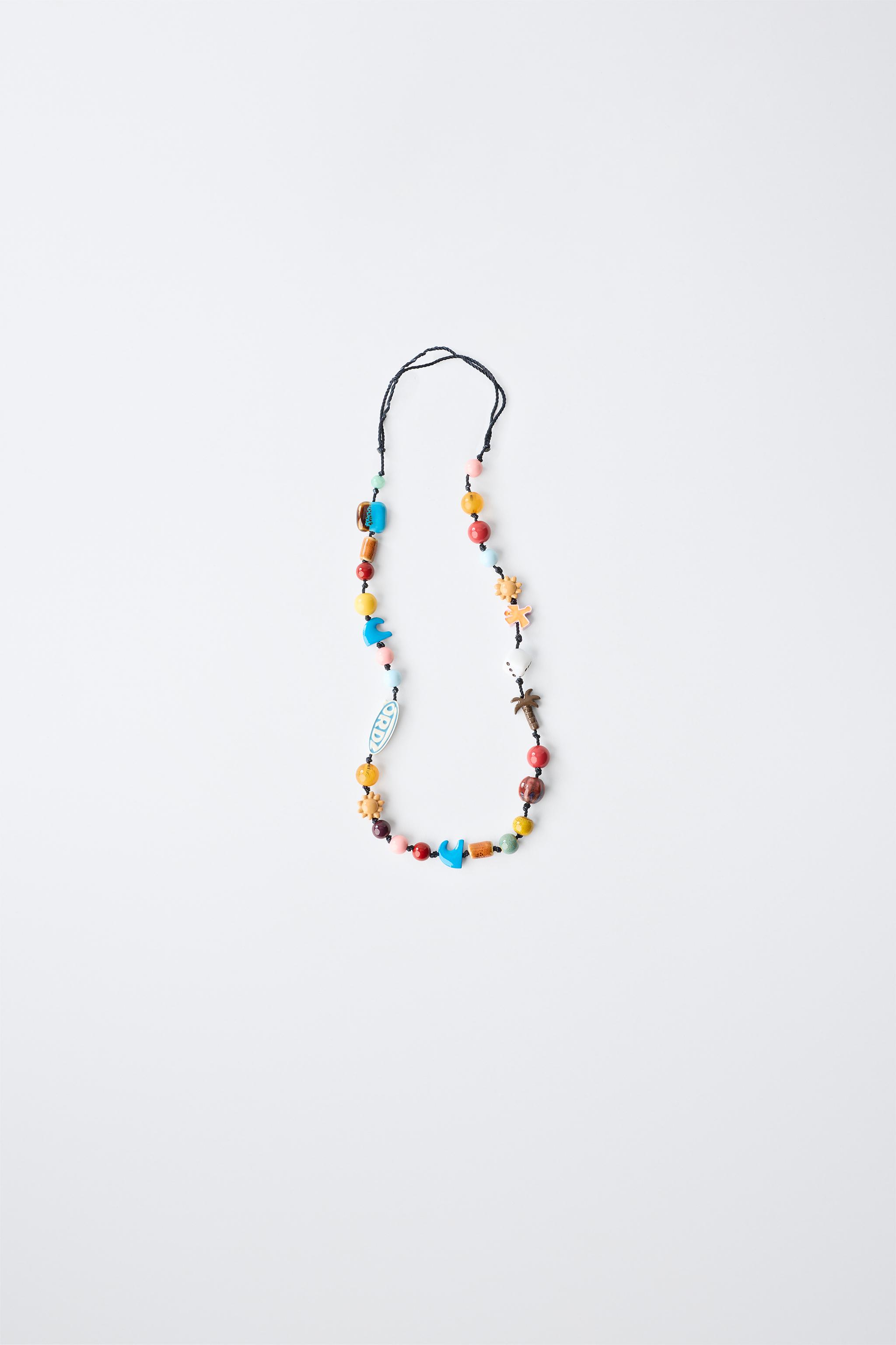 BEADED CORD NECKLACE WITH LOGO